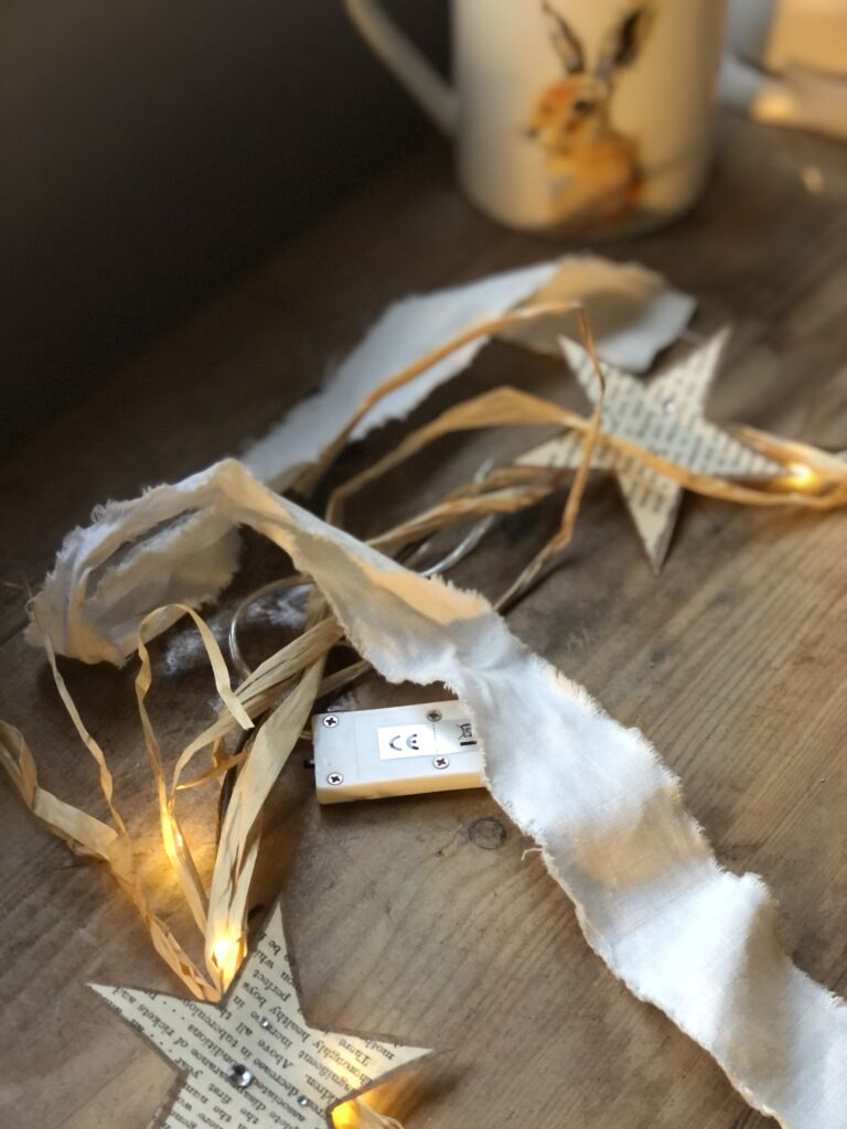 part of a rust wreath with paper stars