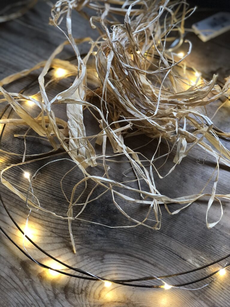 rusty wire and fairy lights and raffia paper