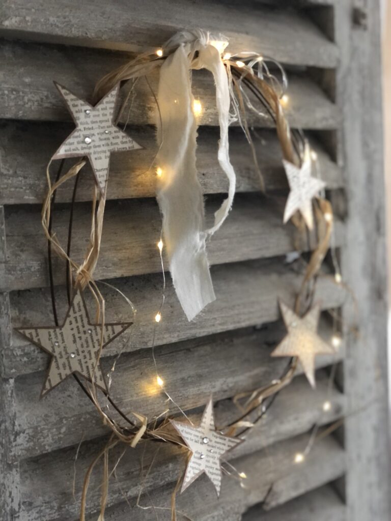 paper star wreath on French shutter