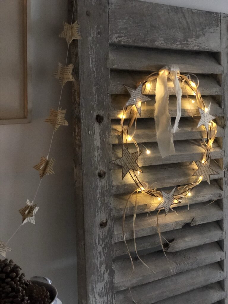 paper star wreath on French shutter