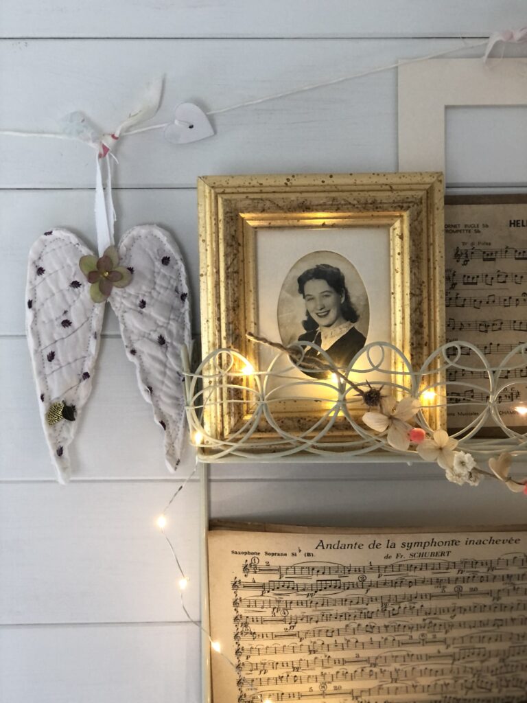 vintage wings with period photo of lady