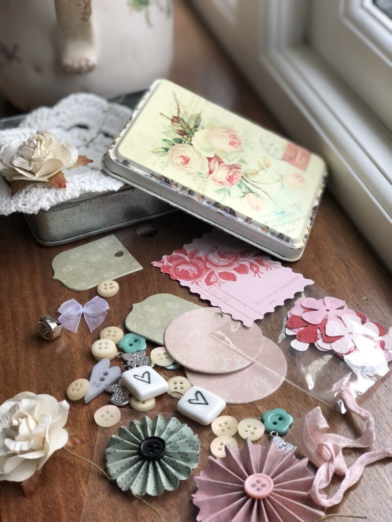 notions and trinkets in vintage tin