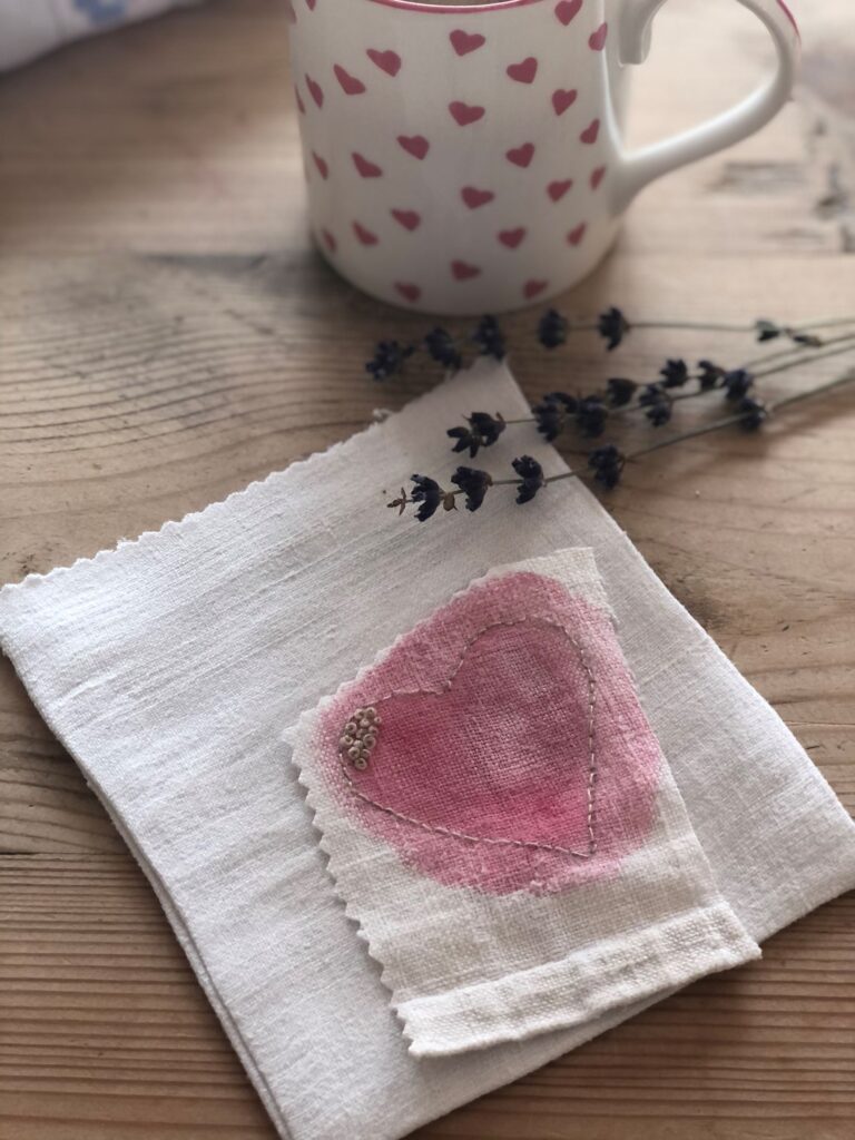 pink watercoloured heart on linen fabric