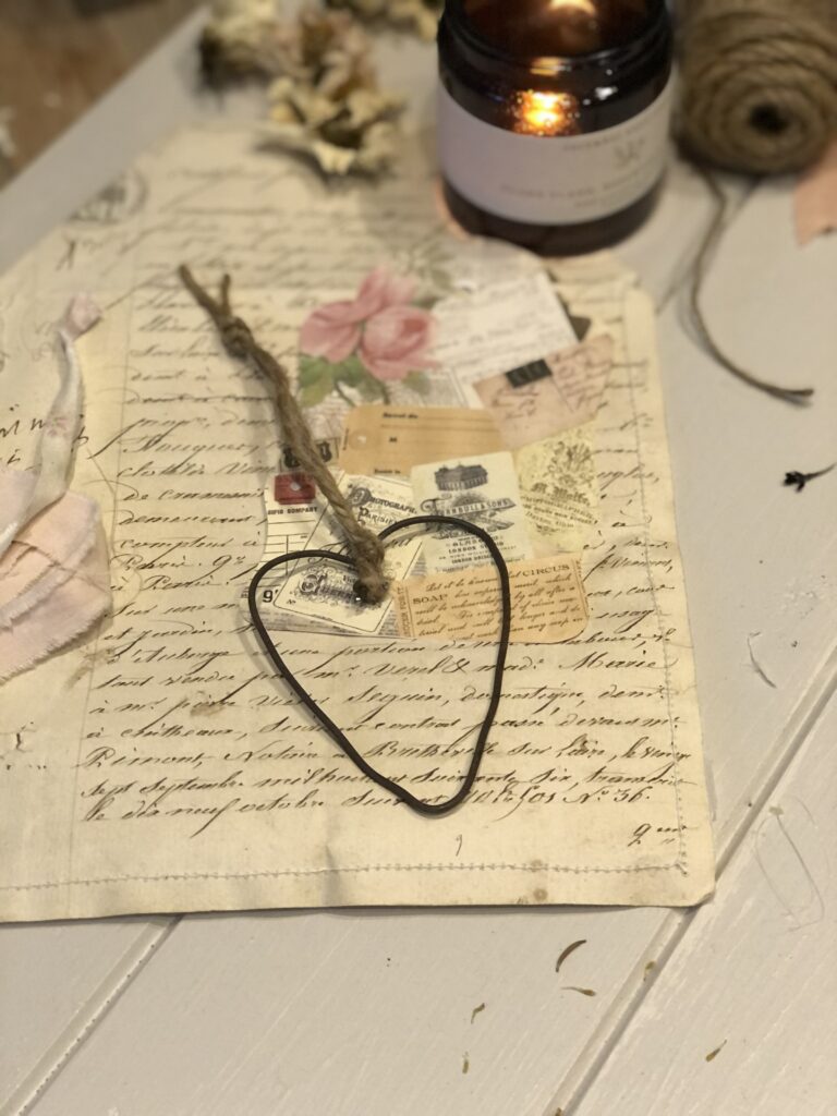 vintage ephemera and rusty wire heart