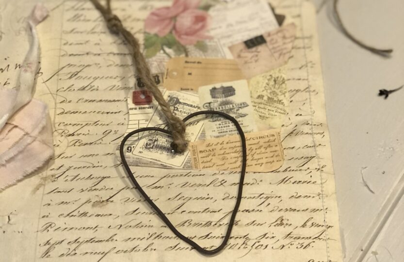 vintage ephemera and rusty wire heart