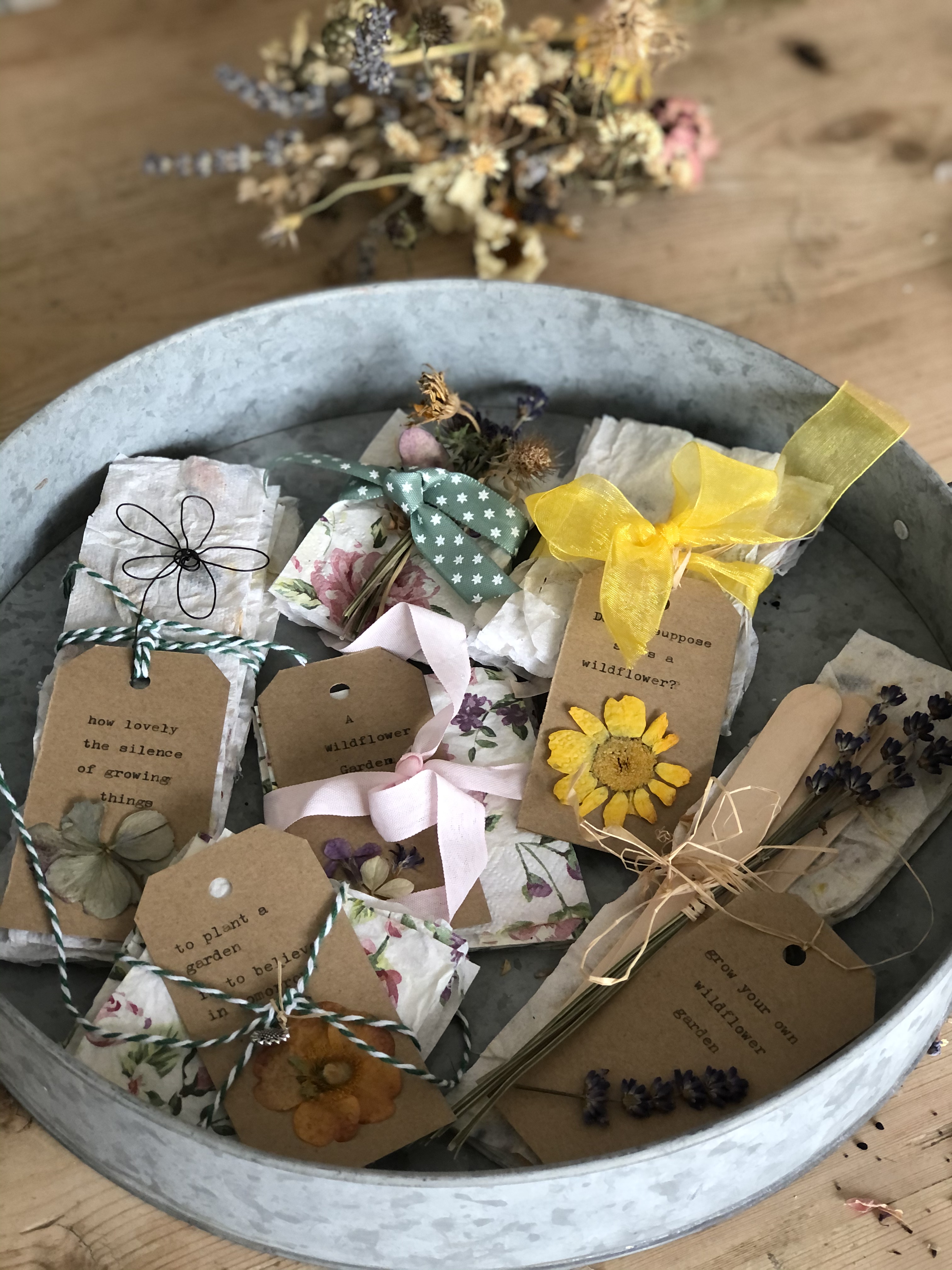 bundles of diy seed paper in galvanised tray