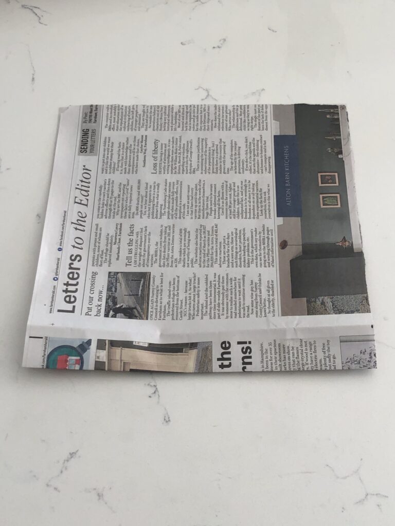 folding the newspaper