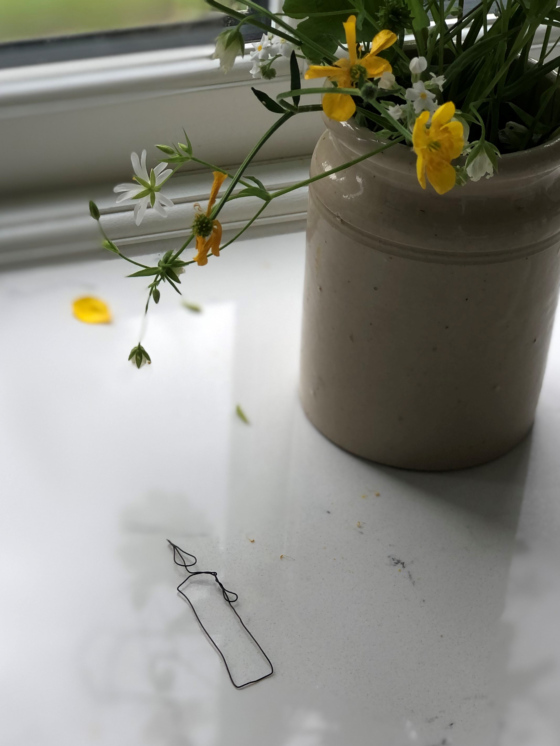 wire craft candle and flowers in pot