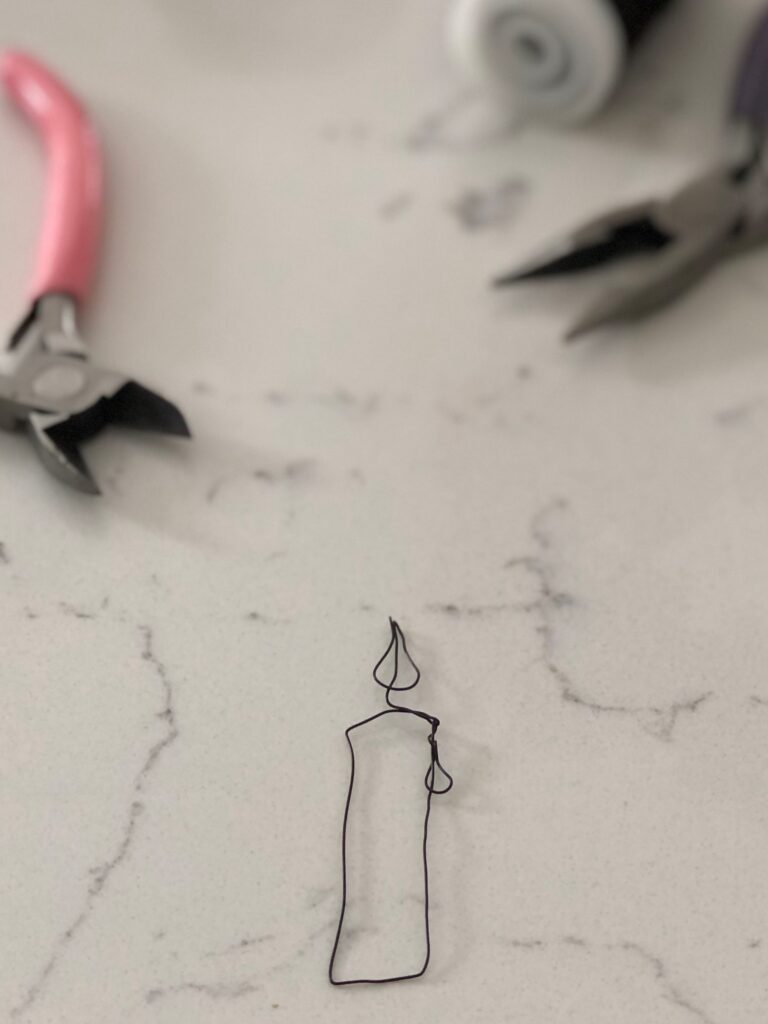 wire craft candle with pliers