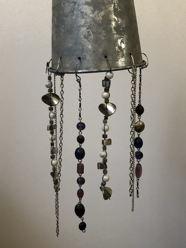 Wind Chimes adding dangles 768x1024 - How to make a DIY Bird Scarer - or is it a recycled wind chime...