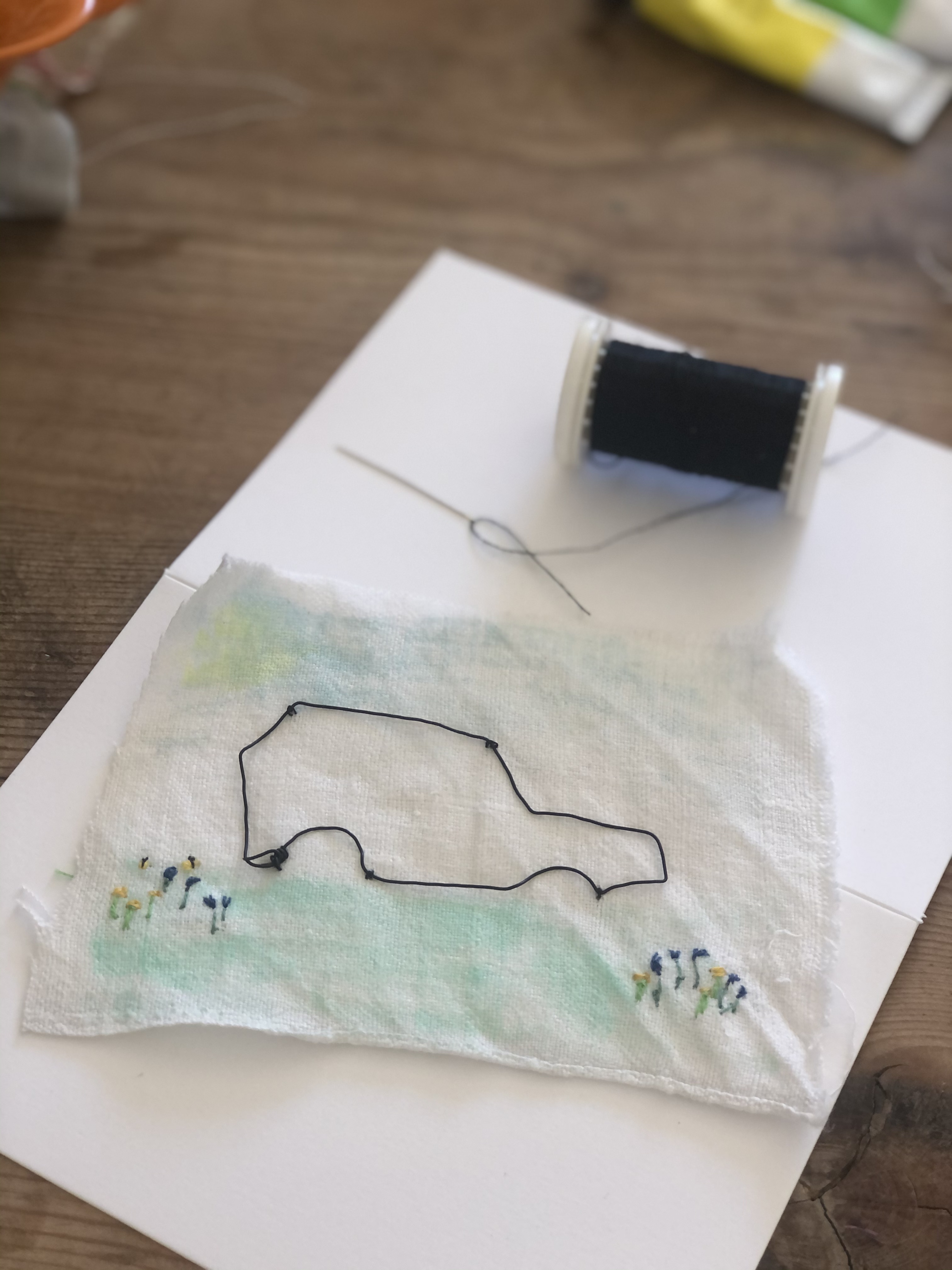 stitching a wire car to vintage fabric