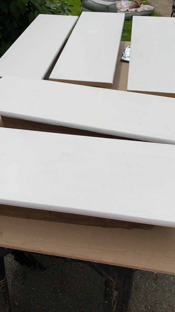 painting shelves of bookcase white