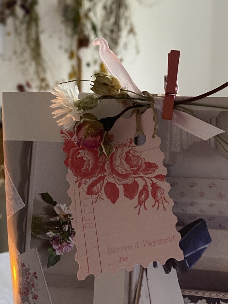 paper gift tag and dried flower decoration with pink peg