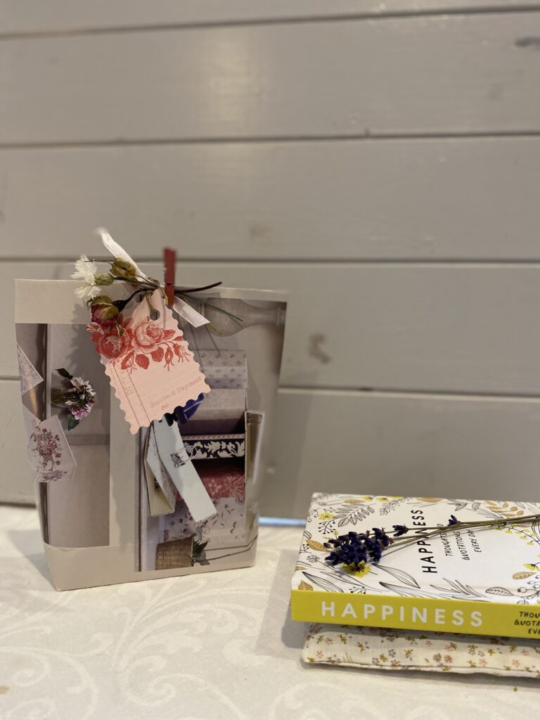 recycled christmas gift bag with mini book and dried lavender