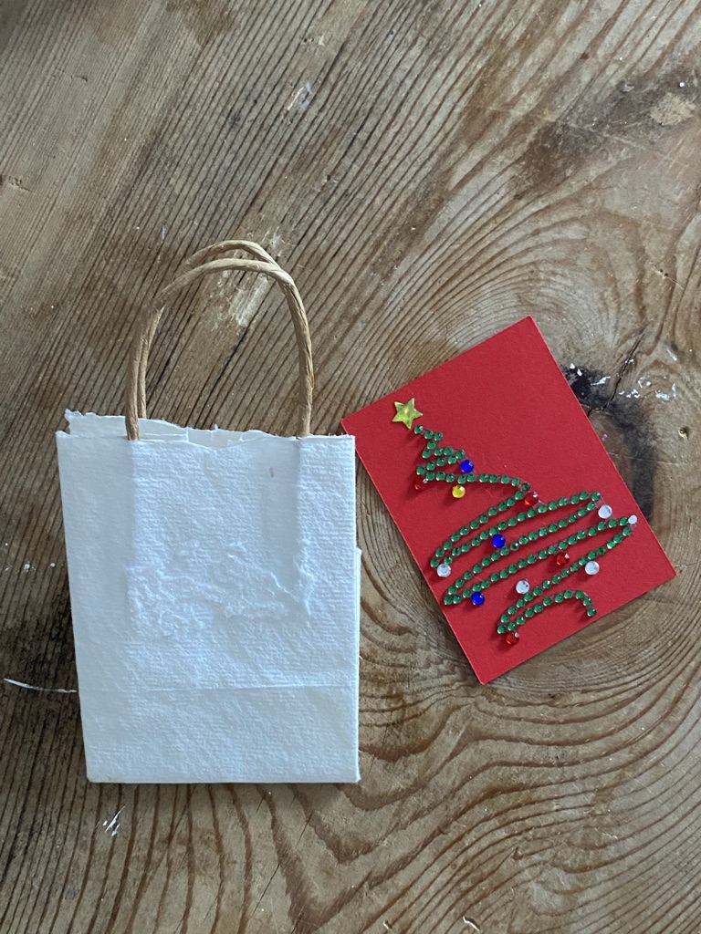 making Christmas gift bags from recycled bags and cards