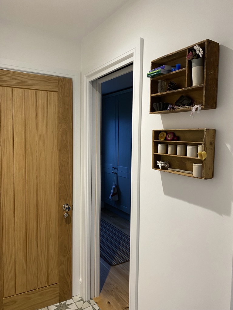 wooden wall shelves with curiosities