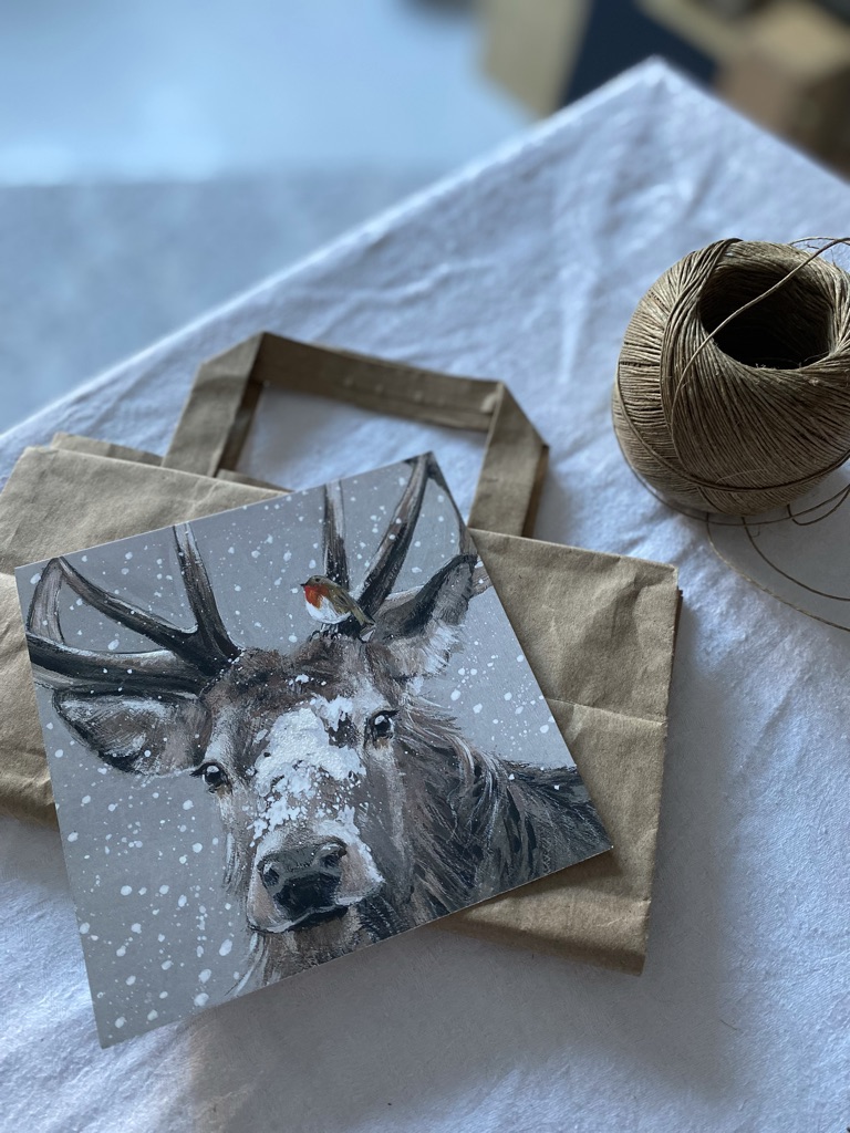 making Christmas gift bags from recycled bags and cards