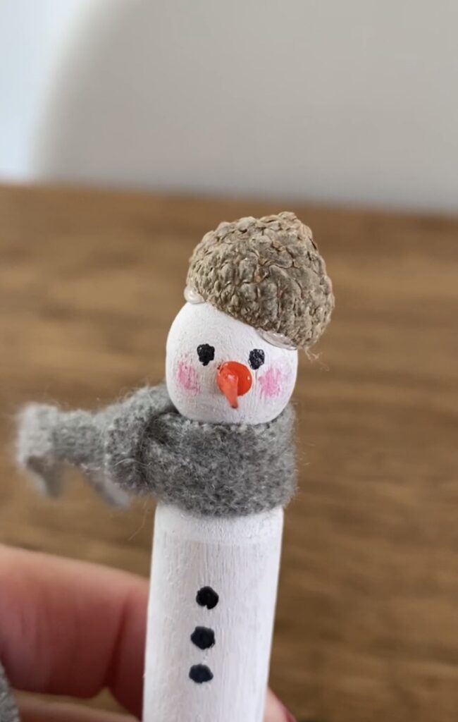 a homemade peg snowman decoration