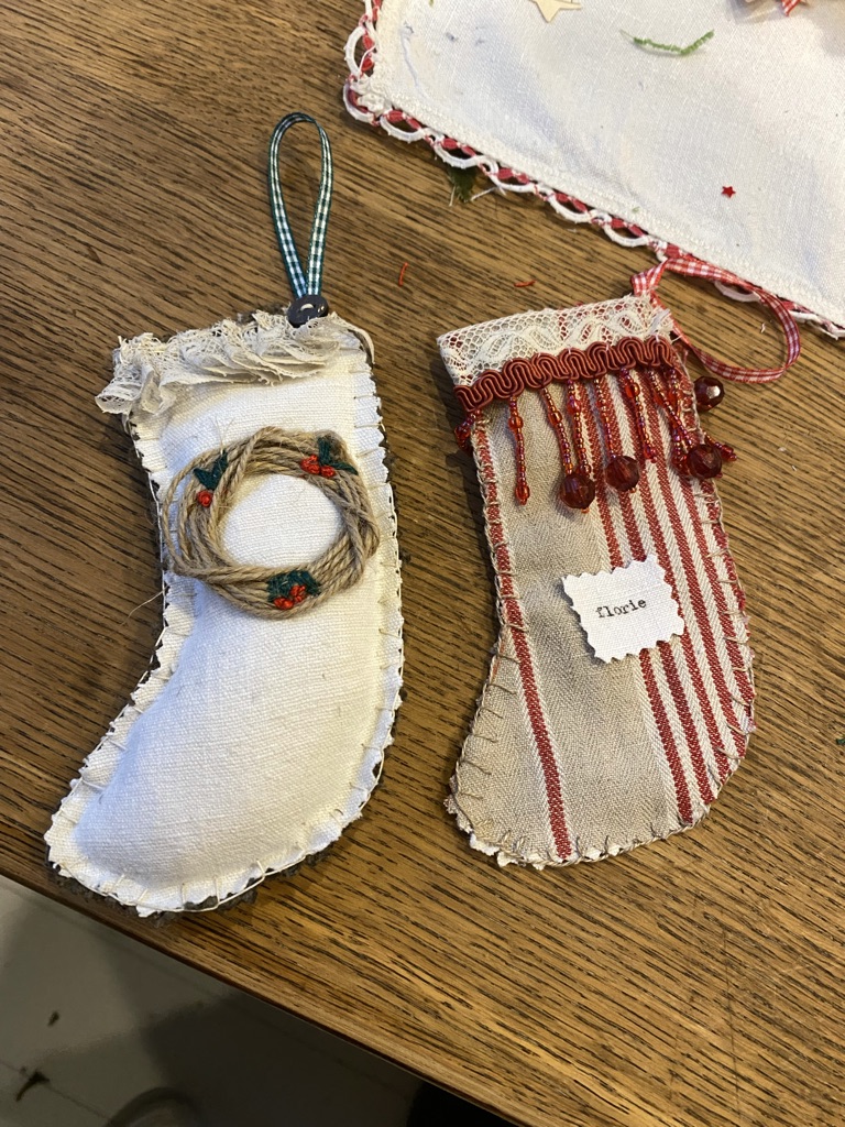 two mini Christmas stockings hand sewn and embroidered 