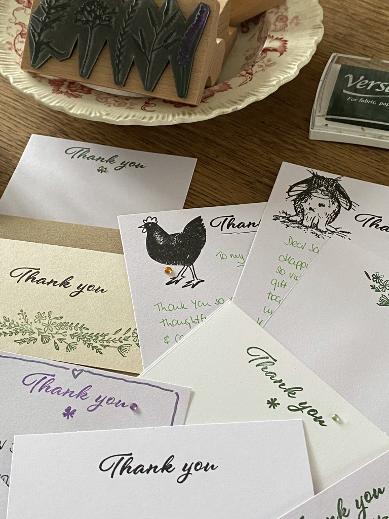 a selection of homemade thank you cards using rubber craft stamps, a rubber craft stamp and ink pad