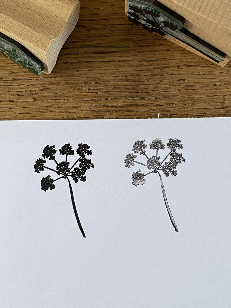 black cow parsley print made from rubber craft stamps partially shown