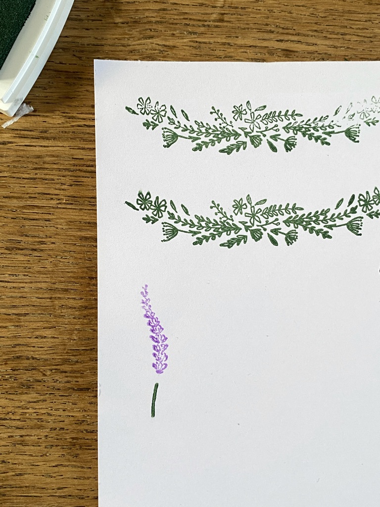 two green floral prints from stamps and one lavender sprig stamped